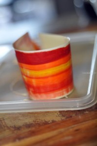 White Chocolate Teardrop with Orange and Yellow Design